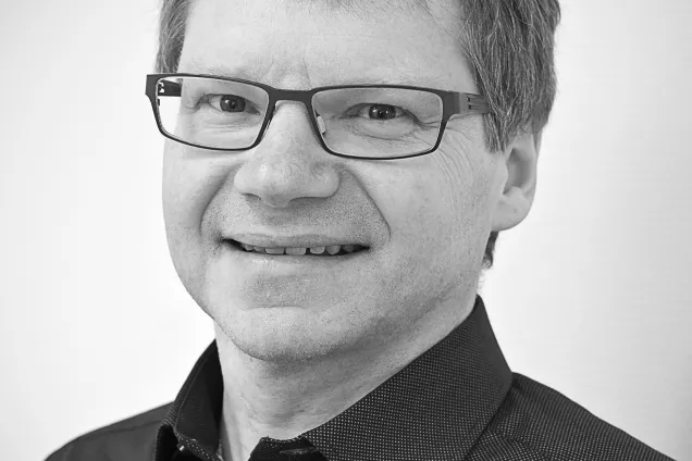 A profile picture of Wilhelm May in black and white.